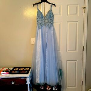 I wore this one time for military ball it’s beautiful no rips or stains